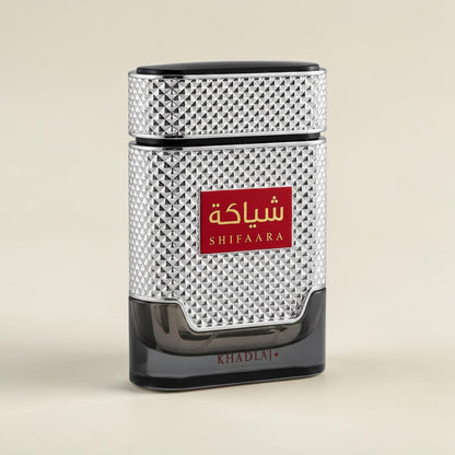Oud Sera Khadlaj Shiyaaka Silver eau de parfum in a textured metallic silver bottle with a red label