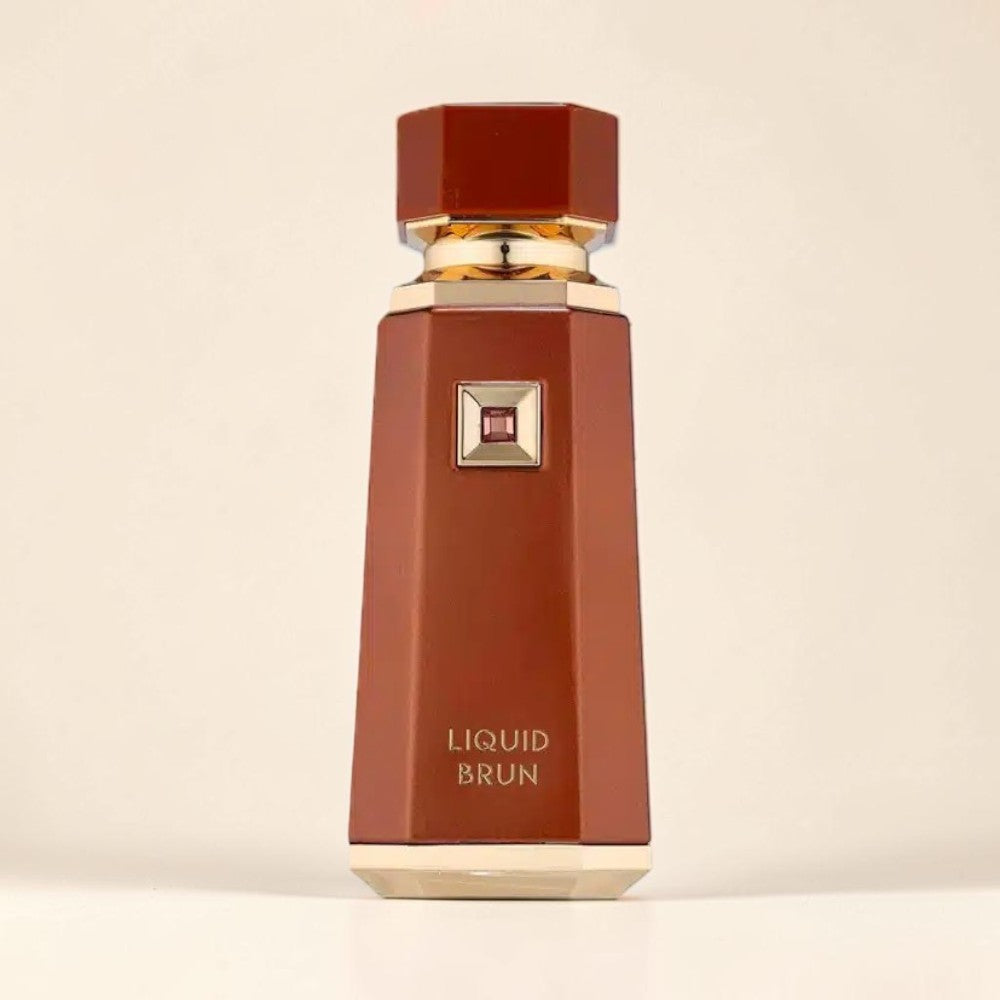 Oud Sera French Avenue Liquid Brun unisex Eau de Parfum in a sleek brown bottle with gold accents.